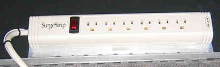 Six Outlet, Filtered & Surge Protected Power Strip Inside